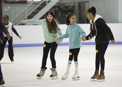 Three Girls Ice Skating